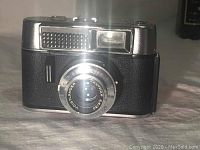 Front view of Voigtlander Vito Automatic 35mm camera showing detailed lens and body.