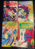 Four Amazing Spider-Man comic books numbered 1, 2, 3, and a Spectacular Spider-Man annual with colorful action covers including Spider-Man on motorcycles and battling villains.