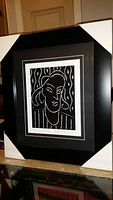 Full view of professionally framed and matted black and white print 'Tenny' by Henri Matisse in protective corner covers, showing overall presentation and frame style.
