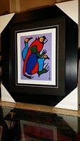 Framed fine art print titled 'Birds with Beaver' showing full view including frame and matting.