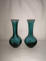 Front view of the pair of Blue Mountain Pottery vases showing their shape and glaze.