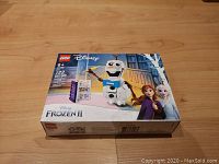 Front view of the unopened LEGO Disney Frozen II Olaf set box showing Olaf figure, set number, and character images.
