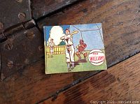 Front of card showing illustrated Ted Williams batting