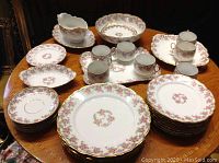 All pieces laid out on table showing full lot