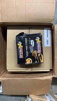 Two Power Stop Extreme Performance brake pad boxes in open shipping box