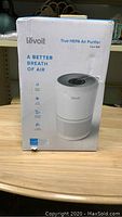 Box of Levoit True HEPA Air Purifier Core 300 showing brand and product features on front.