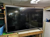 Front view of LG 55-inch TV on table