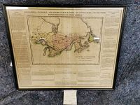 Full-frontal view of framed map showing overall condition and frame style