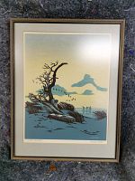 Full view of the framed limited edition print showing a coastal scene and the frame.