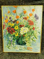 Front view of the oil painting showing the colorful bouquet and frame.