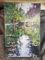 Full view of oil painting showing Japanese-style bridge over reflective water surrounded by greenery.