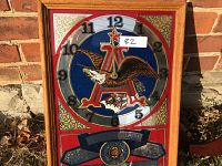 Full view of Budweiser clock showing logo, numerals, and design.