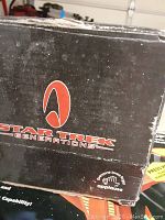 Close up of sealed box for Star Trek The Next Generation Board Game with visible logo and condition