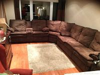 Front view of assembled sectional in room showing all three pieces