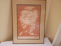 Full view of framed artwork displaying the complete print titled 'Strawberry Sadness'