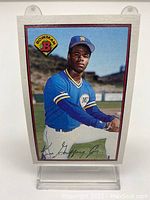 Front view of 1989 Bowman Baseball card #220 featuring Ken Griffey Jr. in uniform with bat.