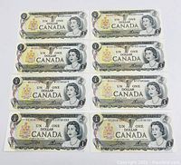 Eight 1973 Bank of Canada one dollar bills arranged in four pairs, facing front with visible sequential serial numbers and Queen Elizabeth II portrait.