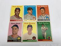 Front view of six 1958 Topps baseball cards showing portraits and action images of players Tony Taylor, Art Ceccarelli, Bob Malkmus, Bob Shaw, Dick Brown, and Bob Taylor with colorful backdrops.