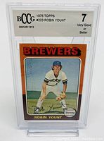 Front of 1975 Topps #223 Robin Yount rookie card in protective Beckett slab, showing player in Brewers uniform with orange border.