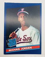 Front of the 1994 Michael Jordan Rated Rookies card showing Michael Jordan in a white baseball jersey and a bat.