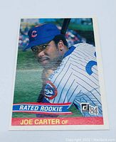 Front side of the 1984 Donruss Baseball card #41 showing Joe Carter in Chicago Cubs uniform with Rated Rookie banner, name, and Donruss logo with '84.