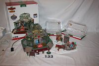 Overview showing Lemax Garden Ballroom, sleigh ride, and ice fishermen figurines with original boxes
