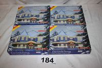 Four boxed sets of Holiday Time brand Twinkling White Curtain Lights, each containing 150 lights, suitable for indoor or outdoor use.