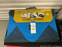 Blue Eagle Creek Pack-It Folder 20 with packaging label attached, promoting wrinkle minimization and packing space maximization.