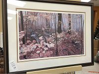 Framed print showing wolves in an autumn maple forest, full view.