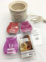 Photo showing ceramic potpourri crock with cord and four sealed wax scent bars arranged in front of it: three Scentsy bars (Scarlet Woods, Aussie Plum, Piedmont) and one ScentSationals wax bar (Buttery Shortbread and Sugared Pecans).