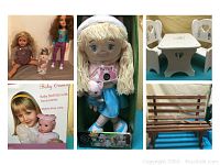 Image shows dolls including Baby Emma doll new in box, other dolls, white doll table and chairs with heart backs, and two wooden benches
