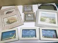 View of all nine beach-themed decorative items together on a white surface.