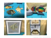 Various colorful fish wall decor items including stained glass fish, sculpted fish figurines, and painted fish hangings.