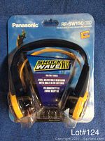 Photo showing packaged Panasonic ShockWave RF-SW150 stereo headphones in original blister packaging with product info.