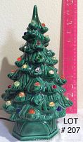 Front view of the 12-inch green ceramic Christmas tree with multicolored light bulbs, shown next to a ruler for scale.