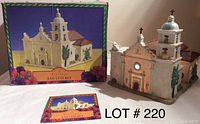 Lighted ceramic house model of the San Luis Rey Mission with original box and informational card visible