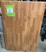 Top-down view of the rectangular bamboo table top, showing the full surface and wood grain pattern.