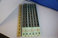 Six 12 inch shelf rails inside original Keil Standard packaging, showing front design with measurements and branding.