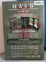 Back of the box displaying detailed description, special features, disc details, and packaging contents