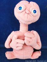 Front view of vintage 1988 Universal Studios E.T. stuffed toy showing detailed facial features and plush body.