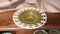 Yellow-green satin glass candy dish with white crimped open lattice edge, hobnail basketweave pattern, viewed from the top