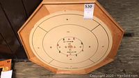 Full view of Bentley Crokinole wooden board with playing surface and frame visible.