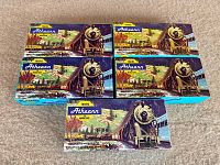 Front view of 5 original Athearn train car model kit boxes featuring locomotive artwork