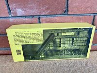 Front of yellow box showing kit illustration and descriptive panel