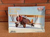 Front of box showing Boeing P-12E in 1/32 scale by Hasegawa Minicraft with image of assembled plane.