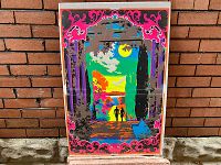 Full view of the neon psychedelic poster against a brick wall showing entire artwork and shrink wrap.