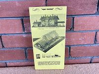 Front of yellow printed box showing HO gauge depot kit artwork and 'super-detailed' text