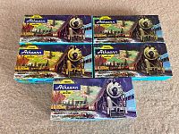 View of the 5 original Athearn boxes displayed flat, artwork showing steam locomotive and scenic railroad.