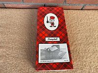 Top view of rectangular box with red plaid pattern, Campbell logo, and picture of completed grain storage bin model. Box titled 'HO - Grain Storage Bin No. 449'.