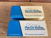 Original blue and beige Pacific Rail Shops boxes showing branding and 'S Scale Model Railroad Equipment' text.